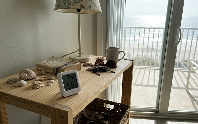 Wi-Fi humidity sensor on a bookshelf in an empty condo